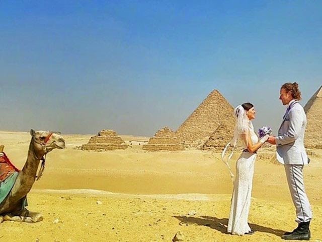 http://elitedaily.com/envision/couple-gets-married-38-different-places-around-world-83-days-photos/971883/