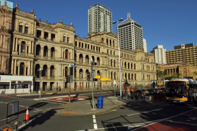 A Brisbane CBD street moment with the Treasury building in the background