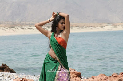 Amala Paul hot navel show in saree stills