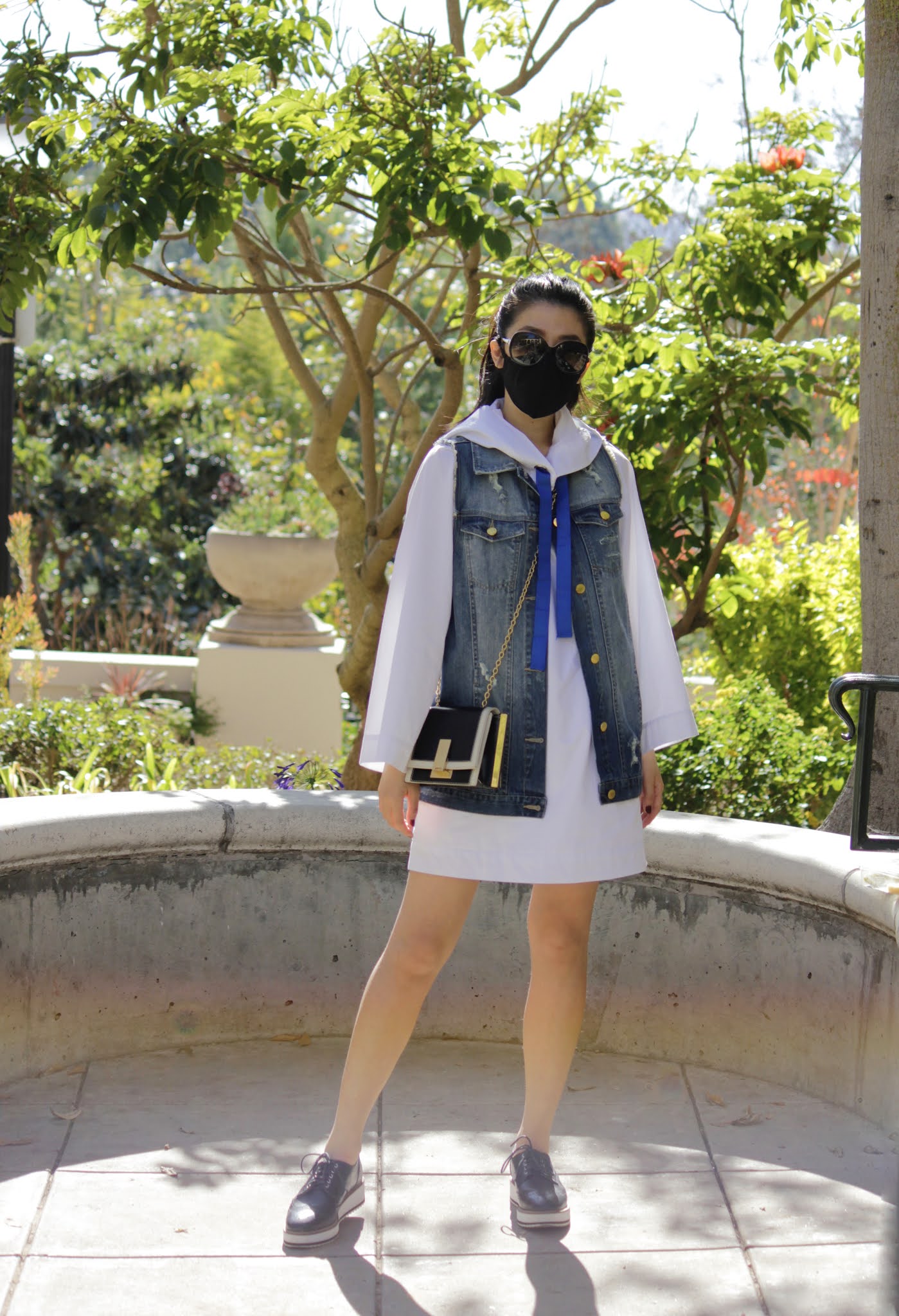 White Hoodie Dress and Denim Jacket Combination for a Casual Everyday Spring Look-Travel Outfit Ideas-Road Trip Outfit-Adrienne Nguyen