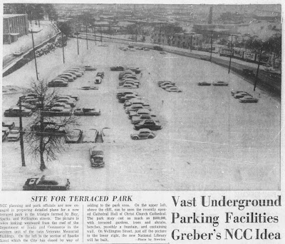 Newspaper photo taken from the roof of the West Memorial Building looking west toward LeBreton Flats, showing in the foreground a parking lot covered in cars and snow with Sparks Street going down the hill on the left and Wellington Street meeting up with it from the right.