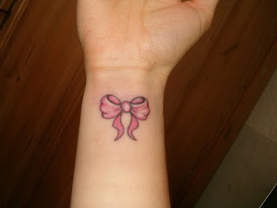 with a pink hair bow, and a star inside her ear are three not shown)