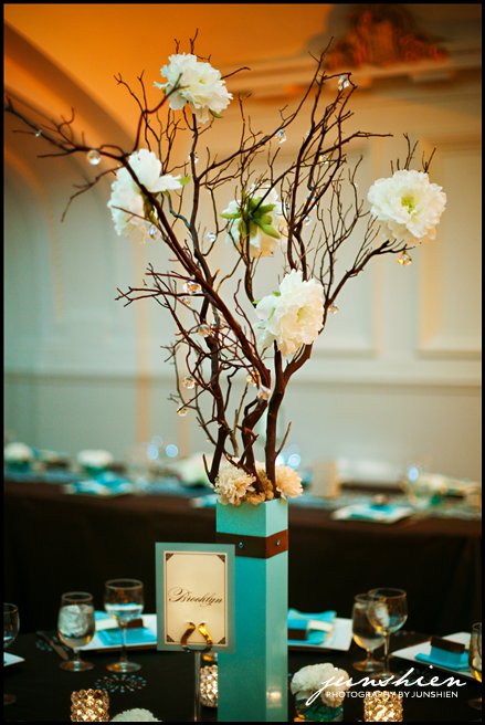 Jessica and Alex made the manzanita branch centerpieces and I accented them
