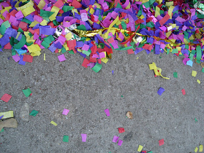 confetti on street by Shearrei Thai
