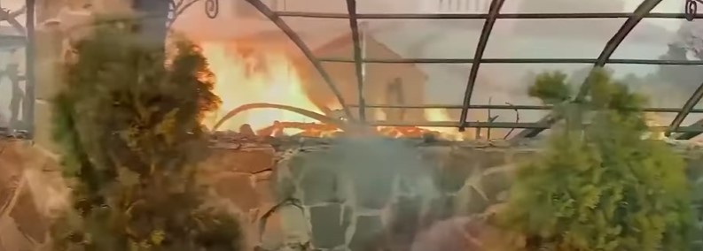 The fire damaged houses of animals - Photo cut from video