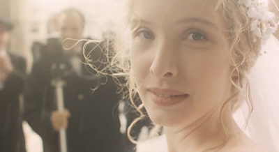 Julie Delpy as Dominique, dressed in white, marriage scene, Three Colors: White, Directed by Krzysztof Kieslowski