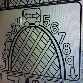 Rounding roller coaster in a 5th grade math word wall