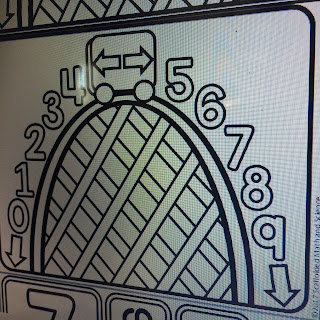 Rounding roller coaster in a 5th grade math word wall