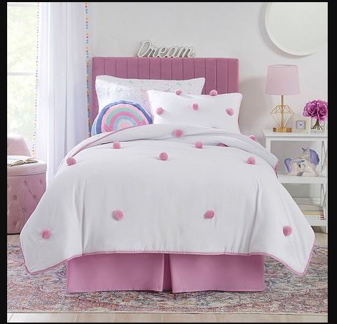 Simple Interior Design for The Bedroom For Girls with pink polka dots wallpaper and white furry rug also purple comforter in platform bed and black