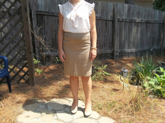 pink bow blouse khaki pencil skirt nude heels gold and pink jewelry outfit inspiration