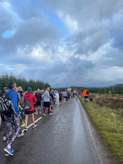 A long line of people queued up for the race toilets.