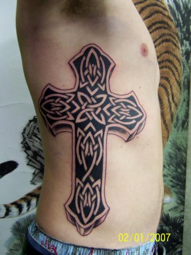 cross tattoos on arm for men