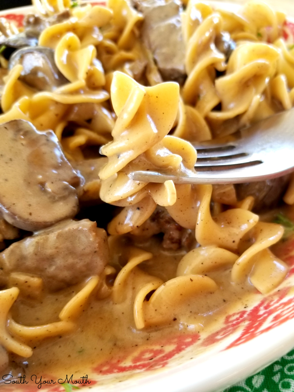 Classic Beef Stroganoff! An easy-to-follow recipe for classic Beef Stroganoff with tender strips of steak, sliced mushrooms and sauteed onions in a velvety sauce made with real sour cream.