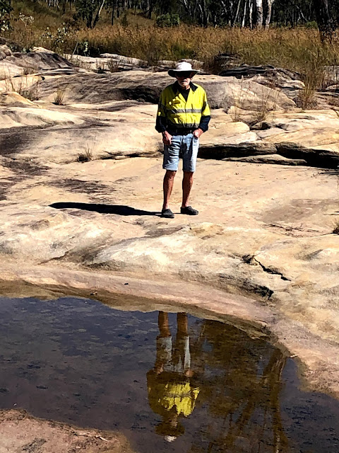 Al standing beside waterhole at the creek at Dargonelly