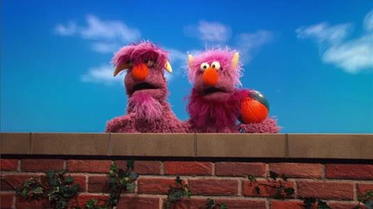Sesame Street Episode 4510. Two Headed Monster learns how to catch a ball.