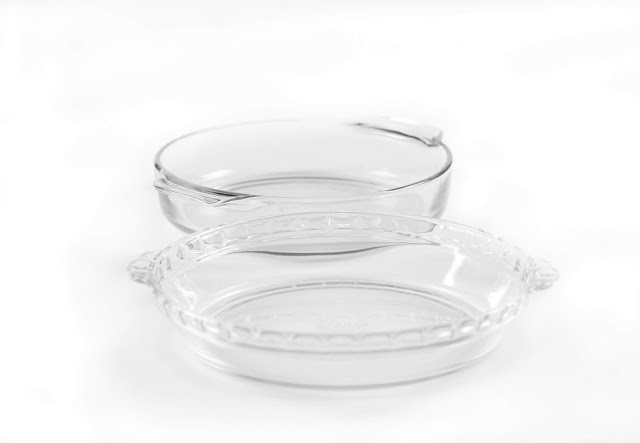 Clear glass pyrex and fire king pie plates.