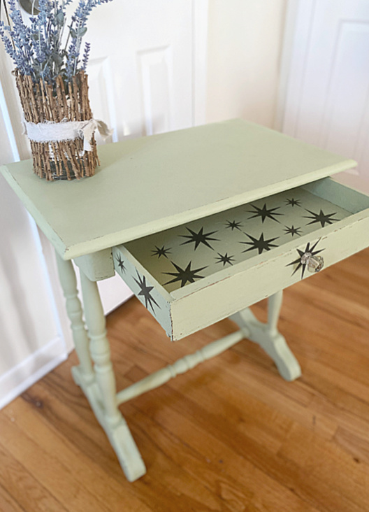 green side table with stenciled drawer