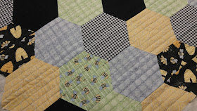 Henry Glass & Co. Sew Bee It fabric hexagon quilt