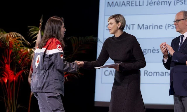 Vice-President of the Monaco Red Cross Princess Charlene wore a black knit wool midi dress by Akris