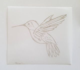 Stamped hummingbird on vellum