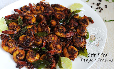 chemmeen kurumulaku varattiyath porichath yummy indian recipe with prawns / shrimp pepper flavored hot spicy side dish with rice fish recipes seafood delicasy prawns / chemmeen / konju fry