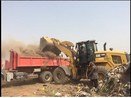 Minister of Environment, Amina Mohammed Drives Bulldozer During Sanitation in Abuja (Photos)