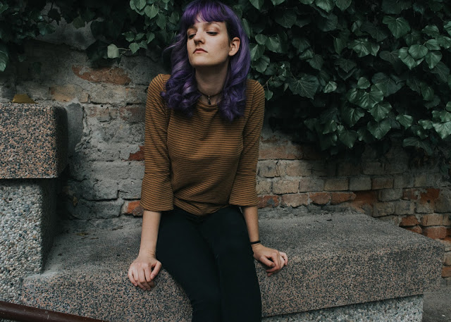 portrait on brick and ivy