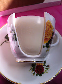 Broken teacup candle