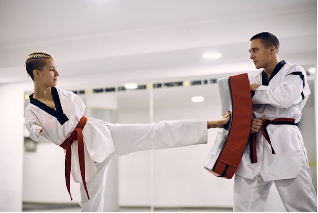 Figure 3 - A child without arms training in martial arts