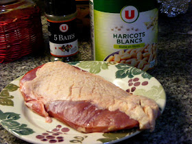 Fat duck breast and white beans. Photographed by Susan from Loire Valley Time Travel. https://tourtheloire.com