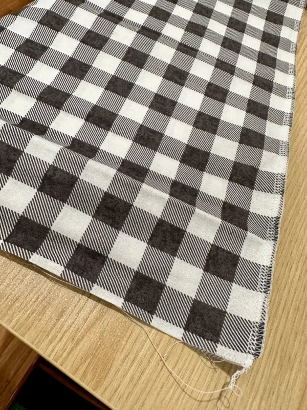 serged fabric on black and white fabric