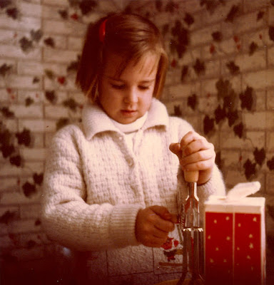 Classics - eggbeaters and that wallpaper. Making "eggnog" at my grandparents' house, early 1960's.