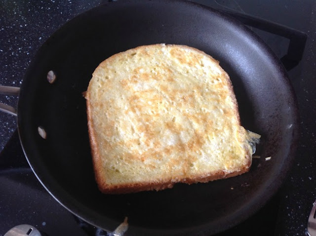 Eggy bread in frying pan