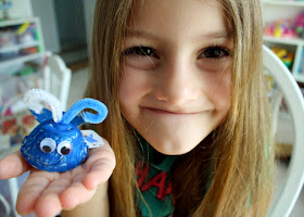 Tessa fashioned a mini whale from an empty egg carton. She colored it blue with a marker and then added wiggly eyes and colored chenille stems for a waterspout. She drew and cutout a matching mini Jonah too!