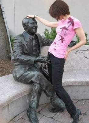 Naughty Statue playing with girl Illusion