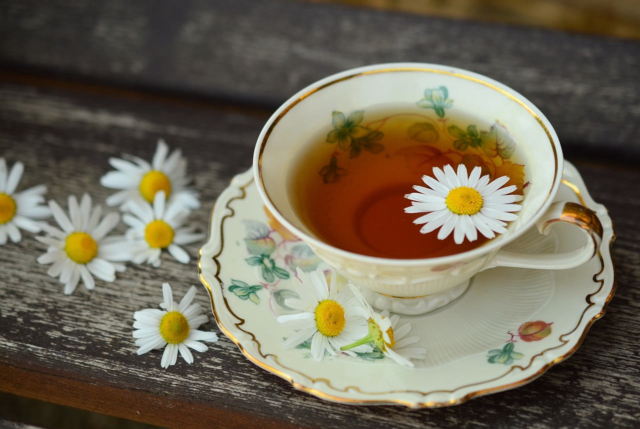 cup of tea with a flower in it