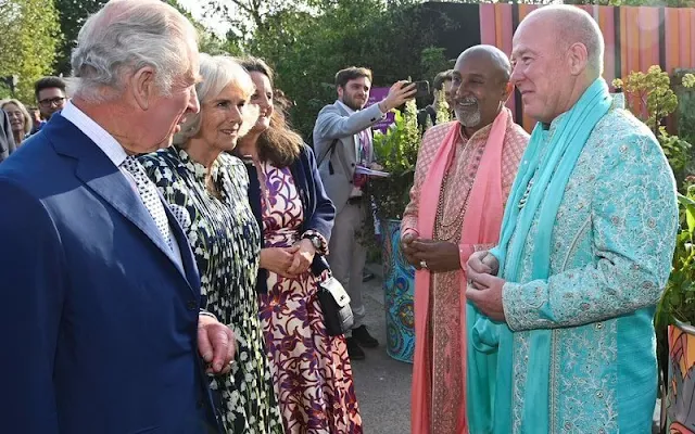 Queen Camilla wore a floral print silk shirt dress by Suzannah. Royal Horticultural Society Great Spring Show