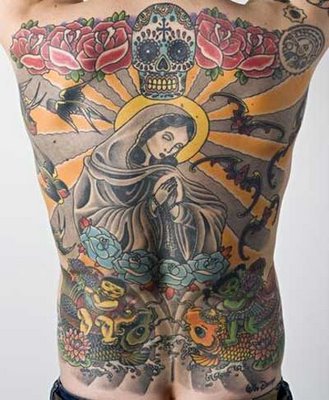 male tattoo designs back. Virgin Mary tattoo for male on