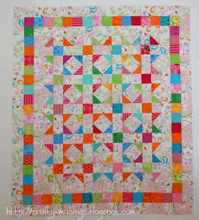 Floating Triangle leftovers quilt top