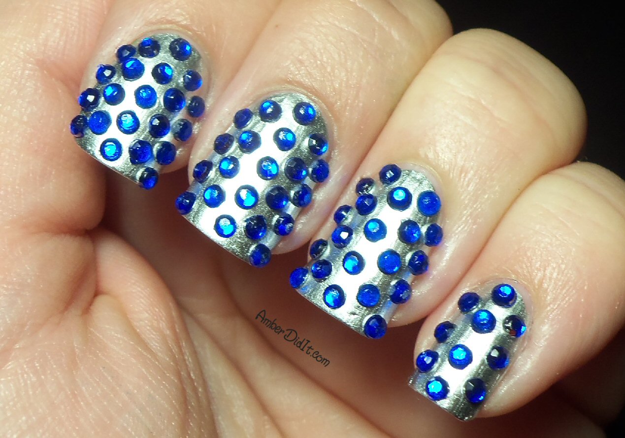 Blue rhinestones nail art