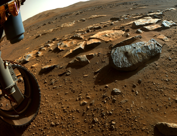 One of Perseverance's wheels is visible near the rock, nicknamed 'Rochette,' that the Mars rover extracted two core samples from...on September 1 and September 7, 2021, respectively.