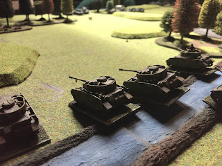 The river is crossed by German Panzer IVs