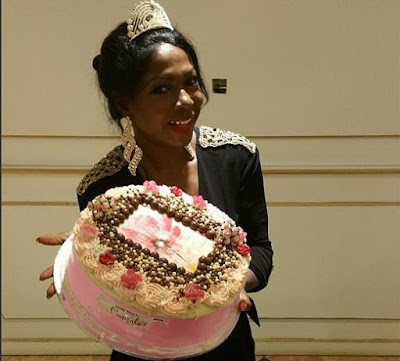 Susan Peters shows cake in picture