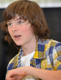  Carl Grimes played by Chandler Riggs