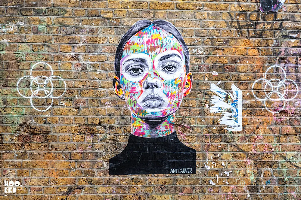 Eye-catching London Street Art by Ant Carver in Brick Lane, London.