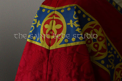 Red Gothic Revival vestments