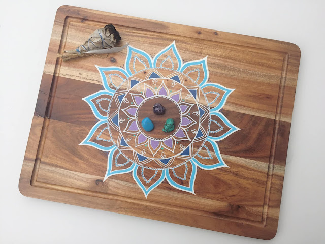 Looking for a new creative outlet? Try using Posca pens to create intricate mandala designs on wood boards, like stunning mandala as the focal point. Let your imagination run wild!