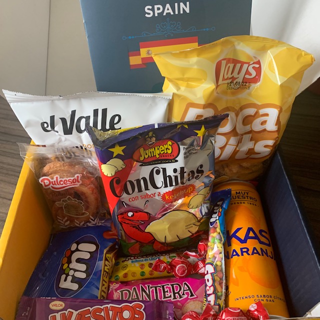 The content of a Spain Snack Surprise box, containing sweet and savoury snacks