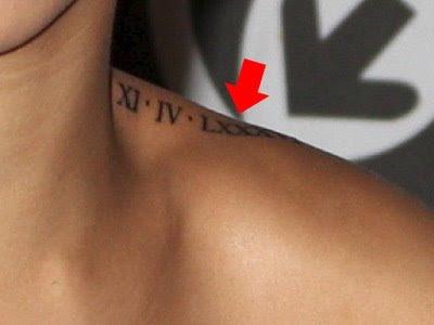 rihanna tattoos neck. rihanna tattoo on hip loves of