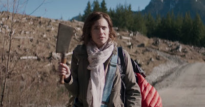 Allison Williams's character Charlotte holds a cleaver in the middle of nowhere in the Netflix horror movie The Perfection